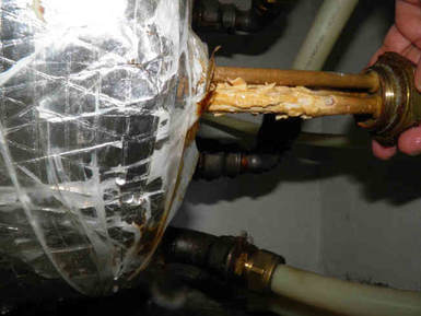 scale built-up on water heater