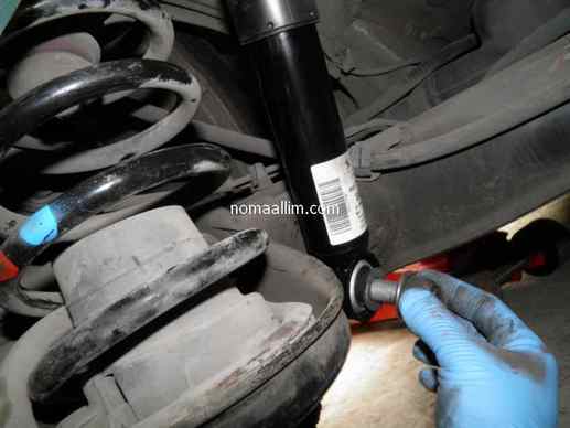 Rear shock absorber replacement