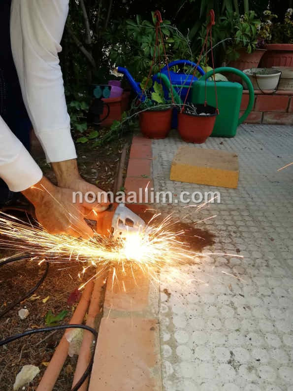 Cutting studs with an angle grinder