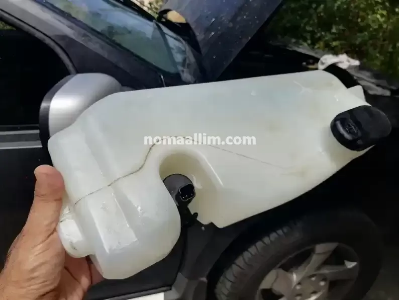 How to clean the windshield wash tank and nozzles