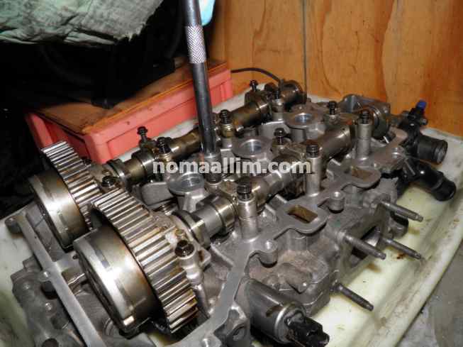 refitting the camshafts and valves