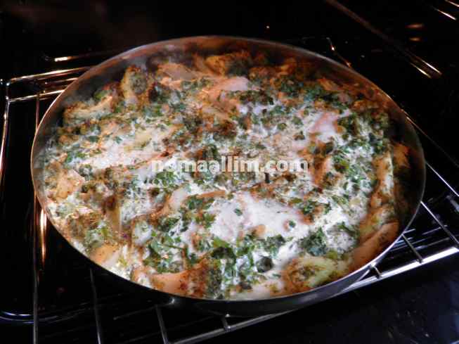 baked fish fillet in white sauce
