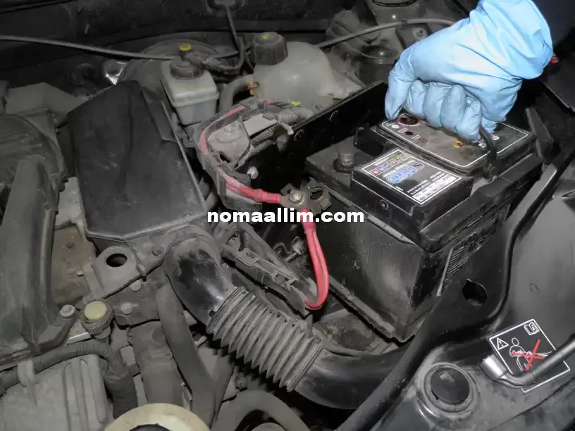 changing the battery of a car