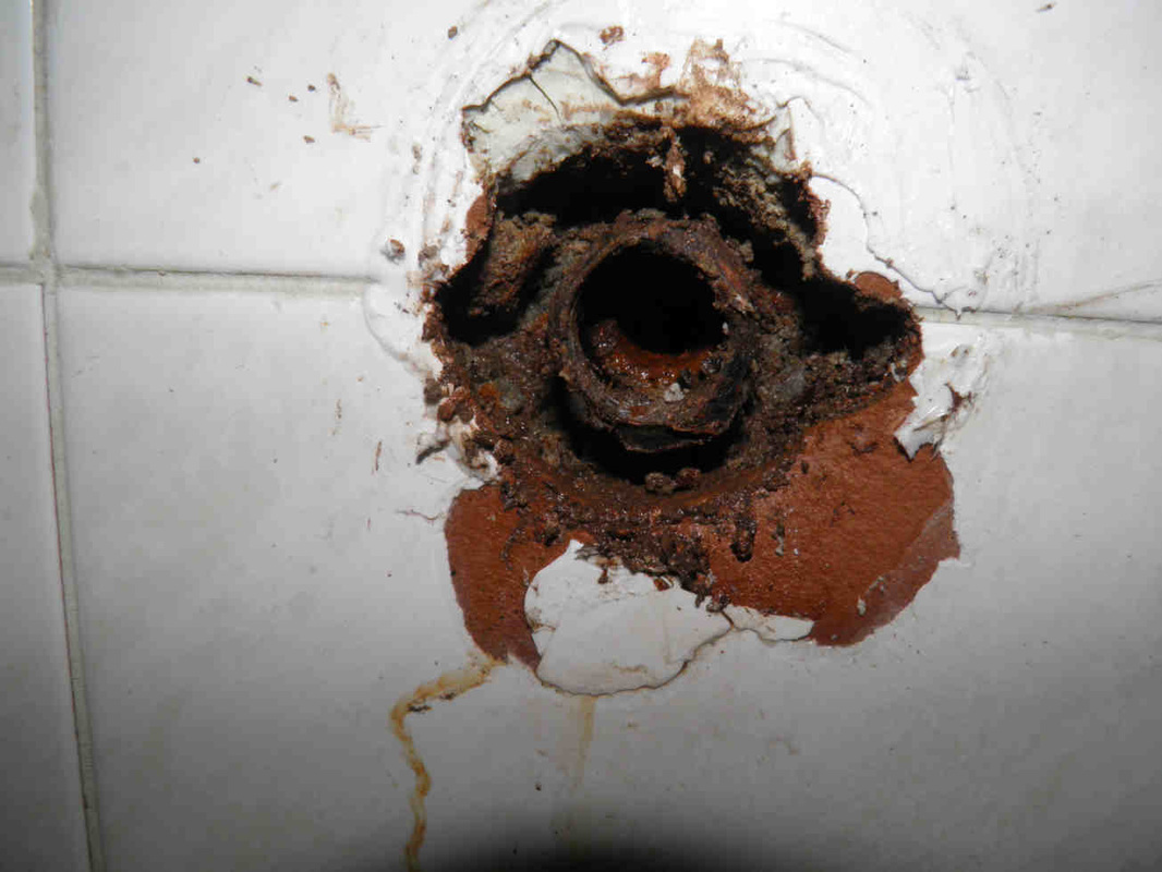Corroded PEX wall outlet