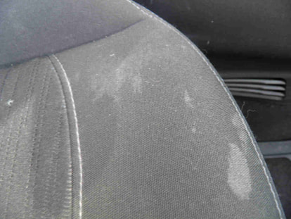 Removing stains from car seats