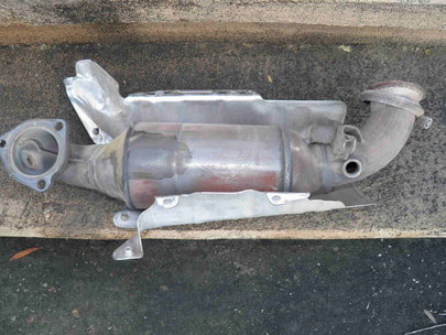 Replacing a catalytic converter